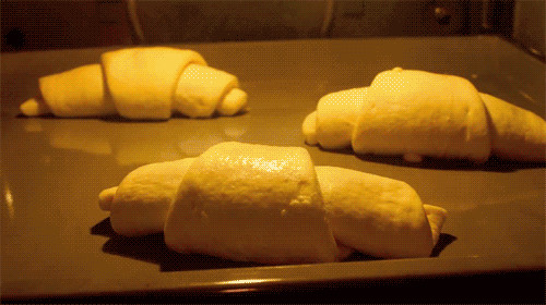Animated timelapse GIF of croissants baking
