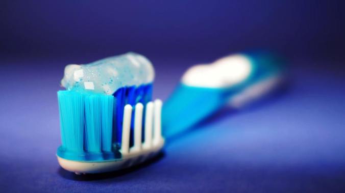Close-up of toothbrush with toothpaste