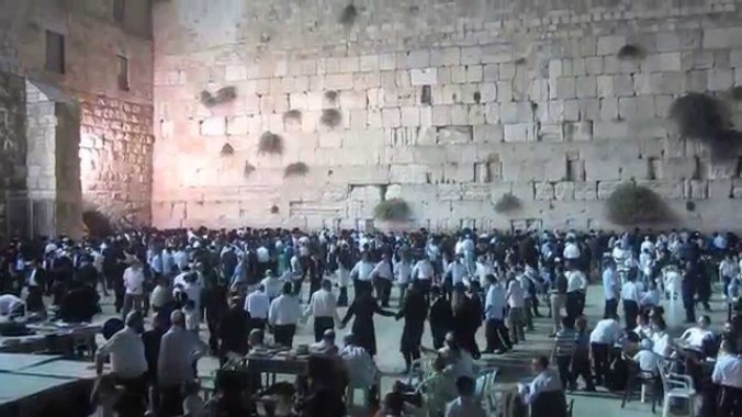 People dancing at the Western Wall in Jerusalem