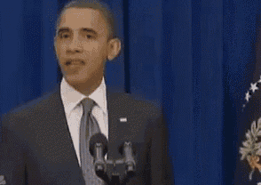 GIF of Barack Obama kicking a door open