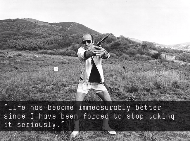 PictureHunter S. Thompson pointing a gun. Caption reads 