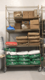 Animated GIF of the author carrying a 50 pound sack of flour back and forth
