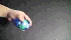 Animated GIF of someone using a gyroscope exerciser