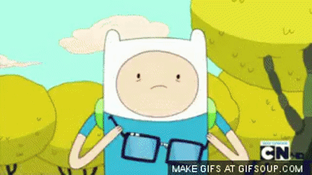 Animated GIF from Adventure Time with Finn putting on a pair of glasses and having his mind blown.
