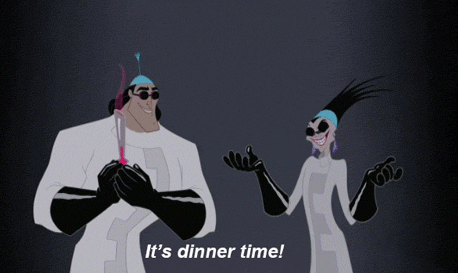 Yzma and Kronk from The Emperors New Groove screaming "It's dinner time." in lab coats.