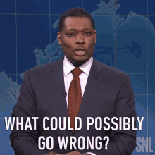 Animated GIF from Saturday Night Live of a man in a suit saying "What could possibly go wrong?"