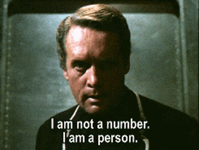 Animated Gif from the Tv Show "The Prisoner" with white text reading "I am not a number. I am a person."