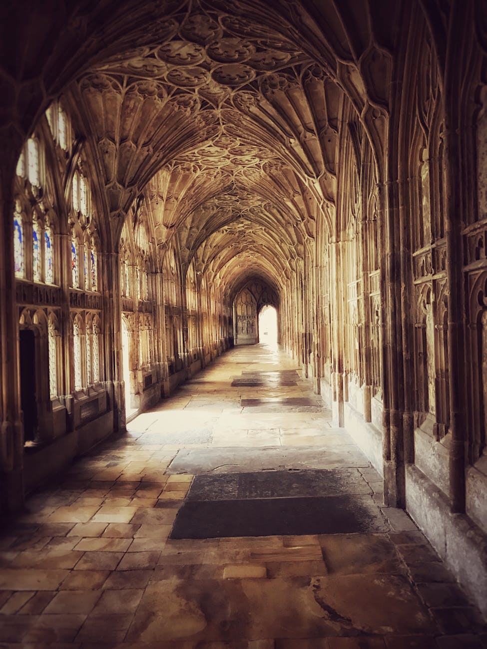 Long shot of a stone hallway in a medieval cathedral